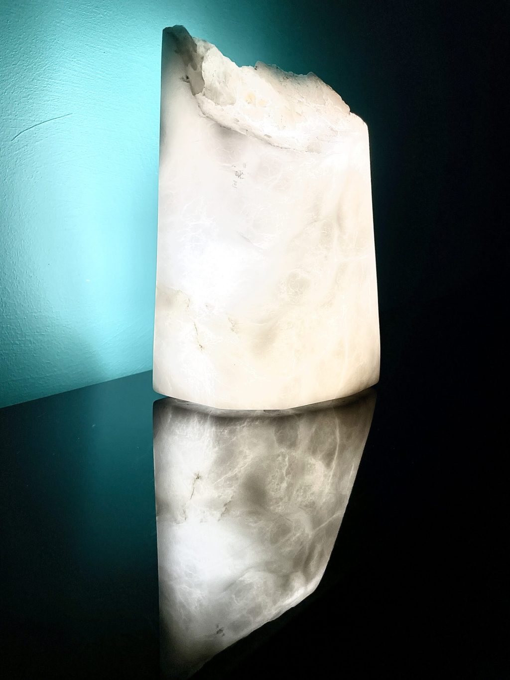 Illuminated White Alabaster. Lit from the back it shows the internal fractures of the stone, creating a window through the stone