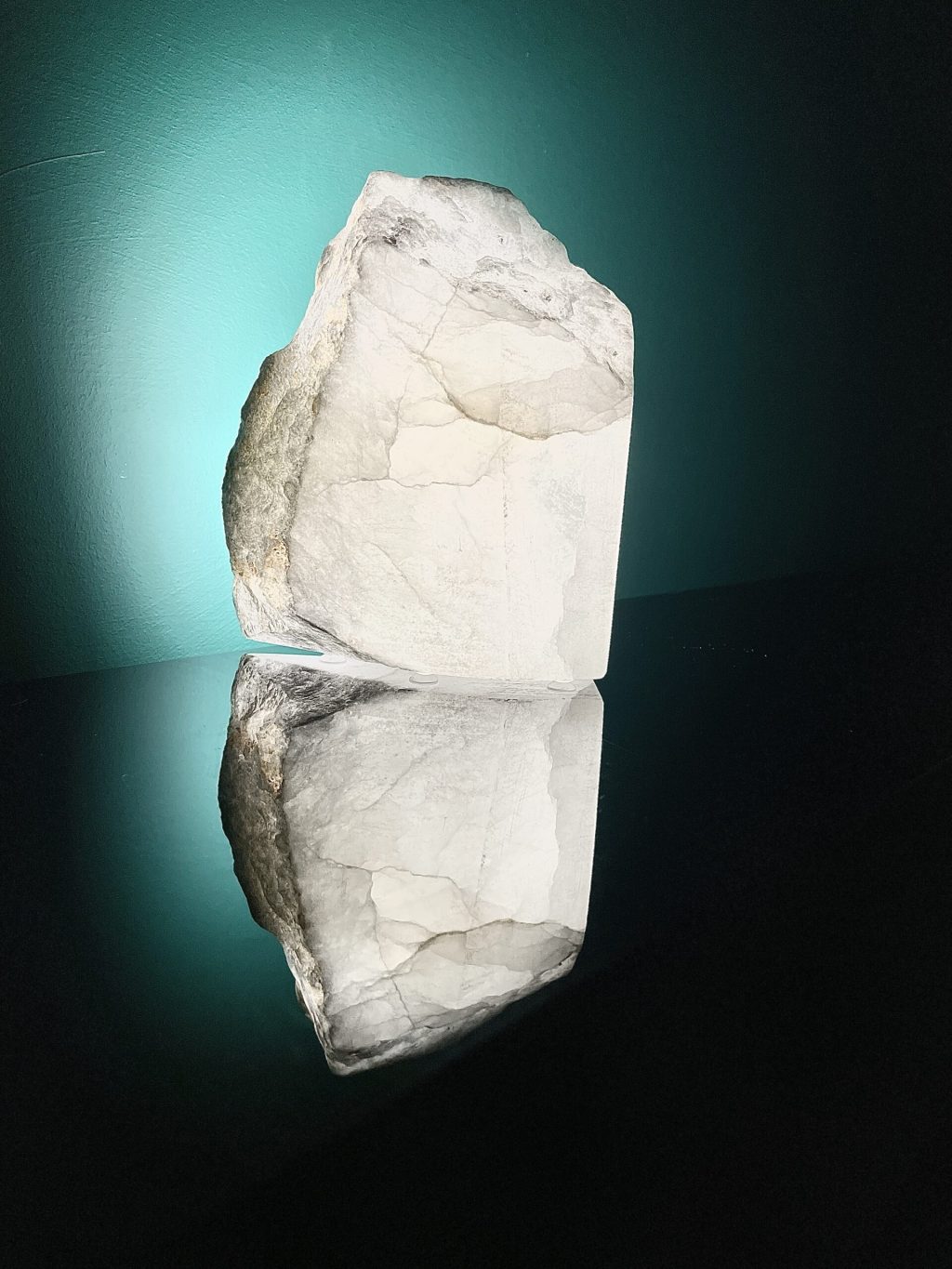 Illuminated translucent Alabaster. Lit from the back it shows the internal fractures of the stone, creating a window through the stone